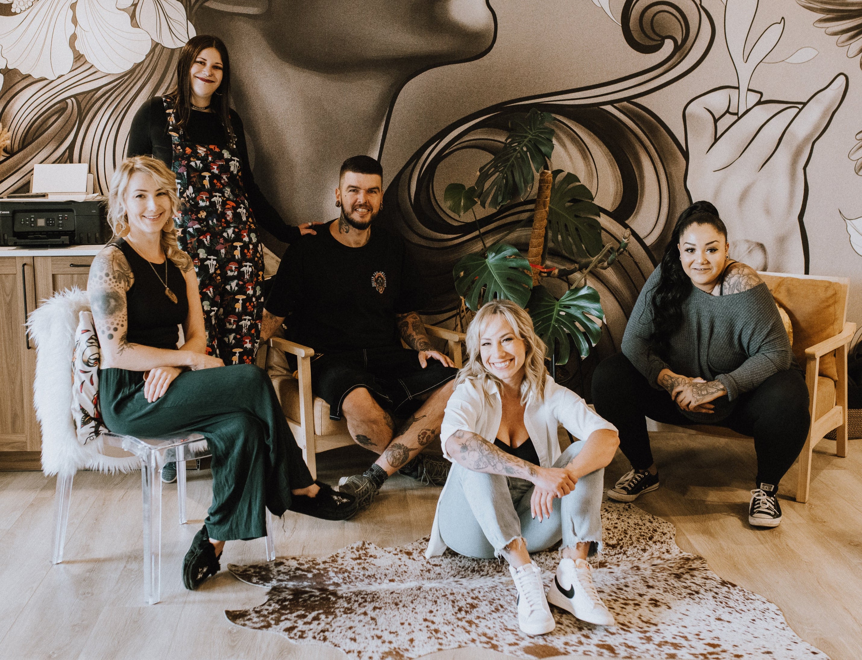 group of Tattoo artists at Sundog Studios tattoo shop in Airdrie Alberta