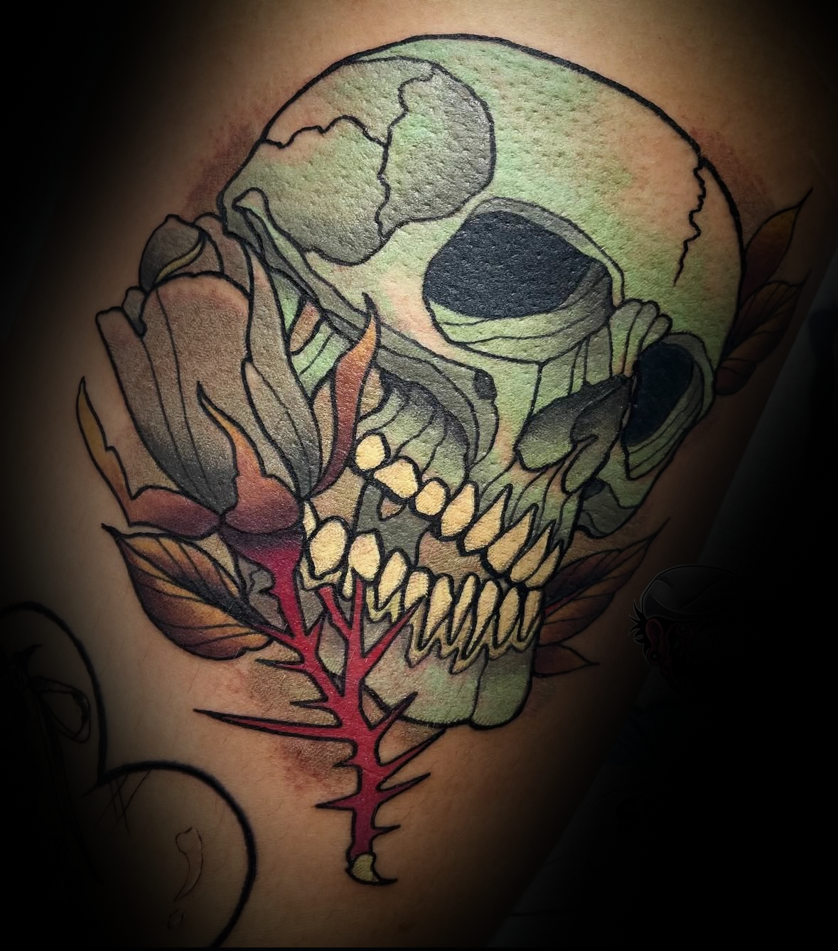 Color skull tattoo with black rose by Rob Adams, tattoo artist at Sundog Studios in Airdrie Alberta