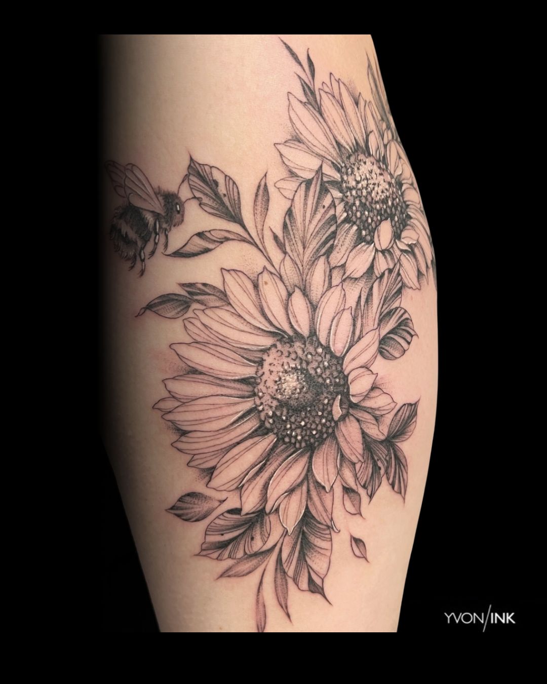 Fine line sunflower floral tattoo with bee on forearm by Yvon_ink at Sundog Studios in Airdrie Alberta